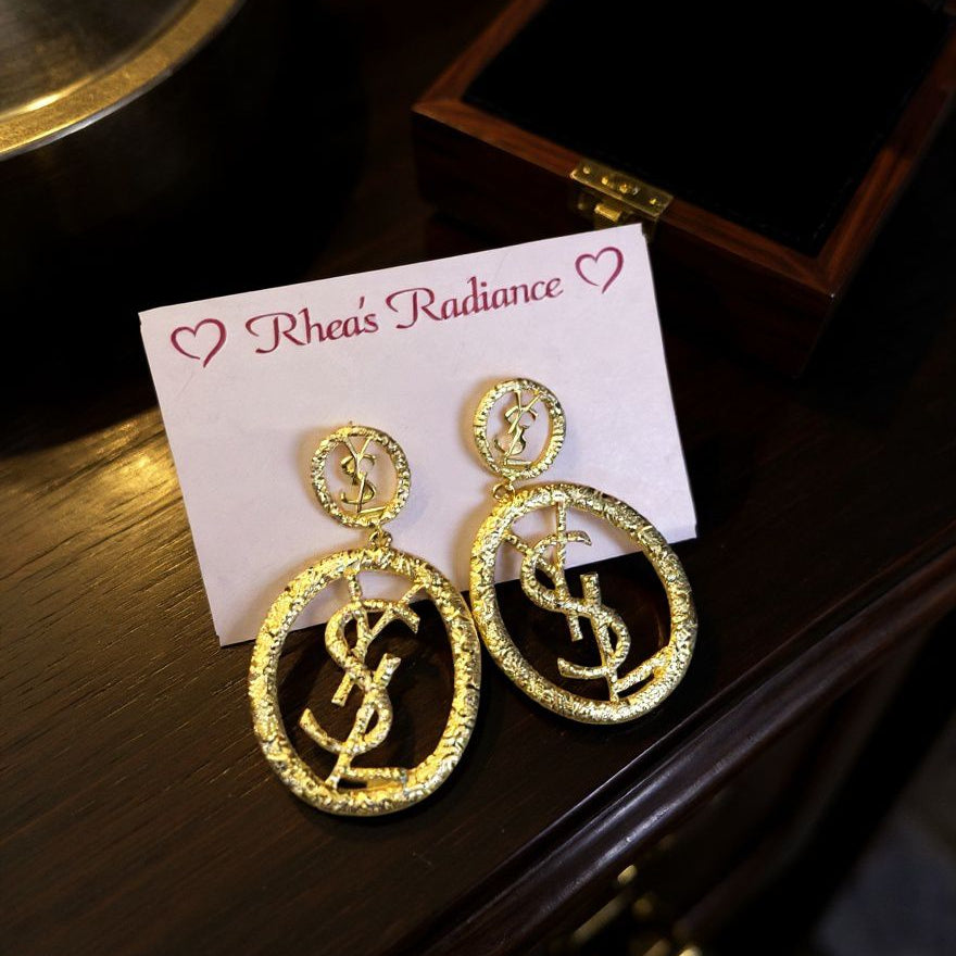 Golden YSL statement hoops