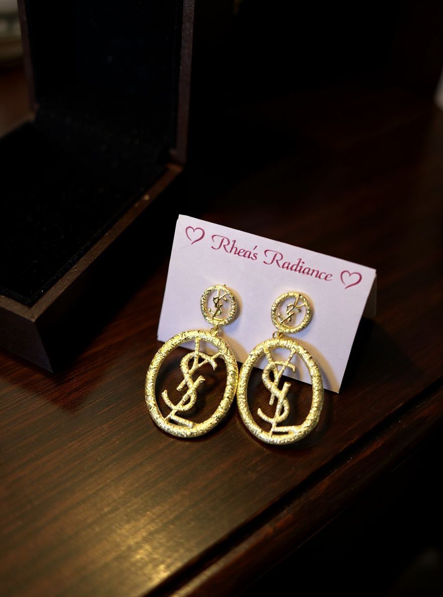 Golden YSL statement hoops